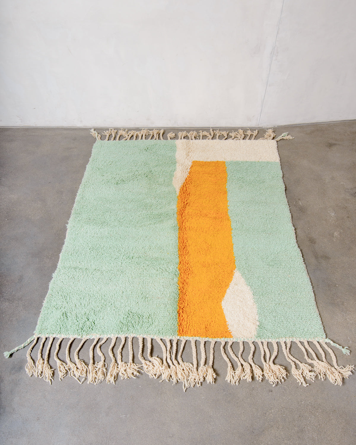 Modern, designer, handcrafted Berber rug from Morocco. Beniourain carpet with beautiful colours and patterns and fluffy wool texture.
